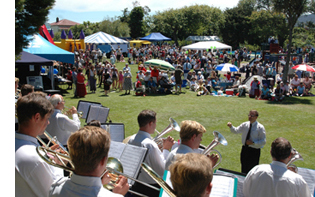 Gloriavale's brass band performing at the park in Greymouth